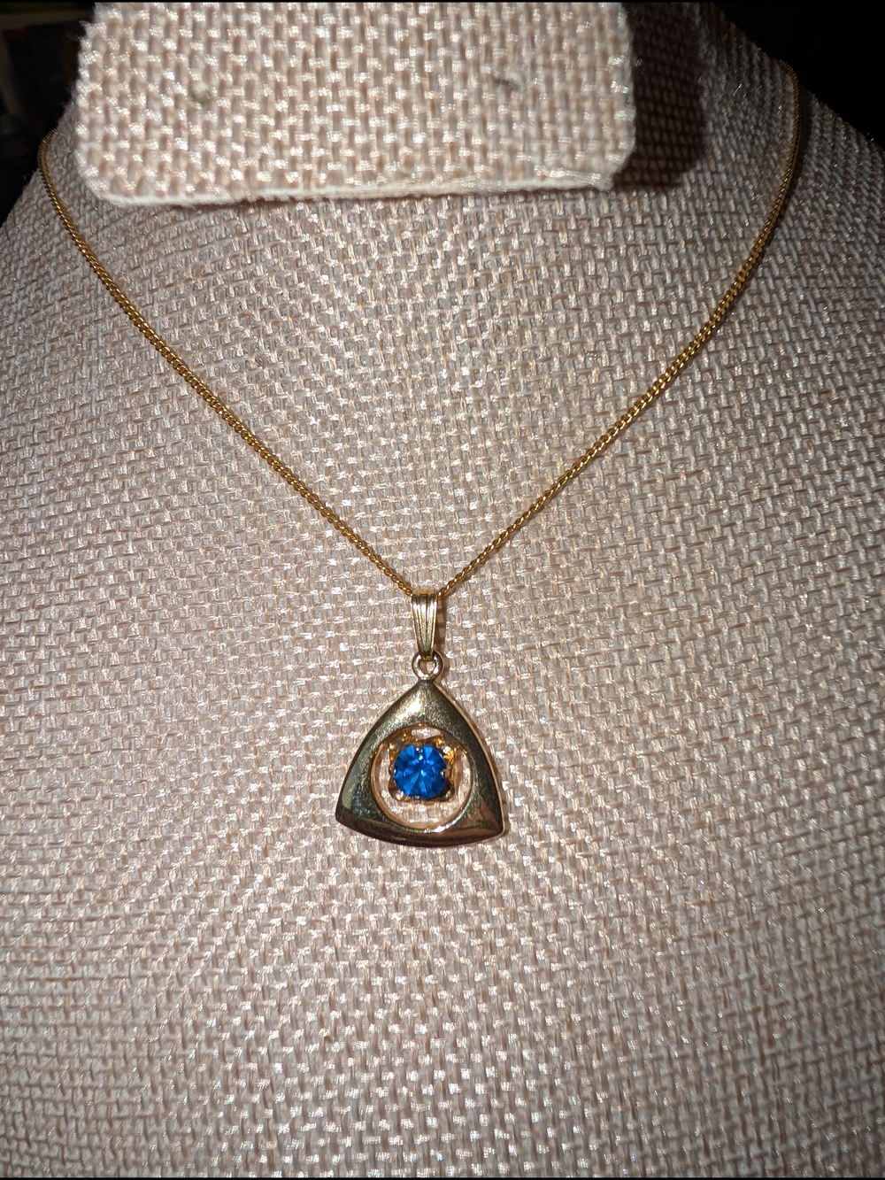 Gold Tone Triangle Pendant Necklace with Blue Stone